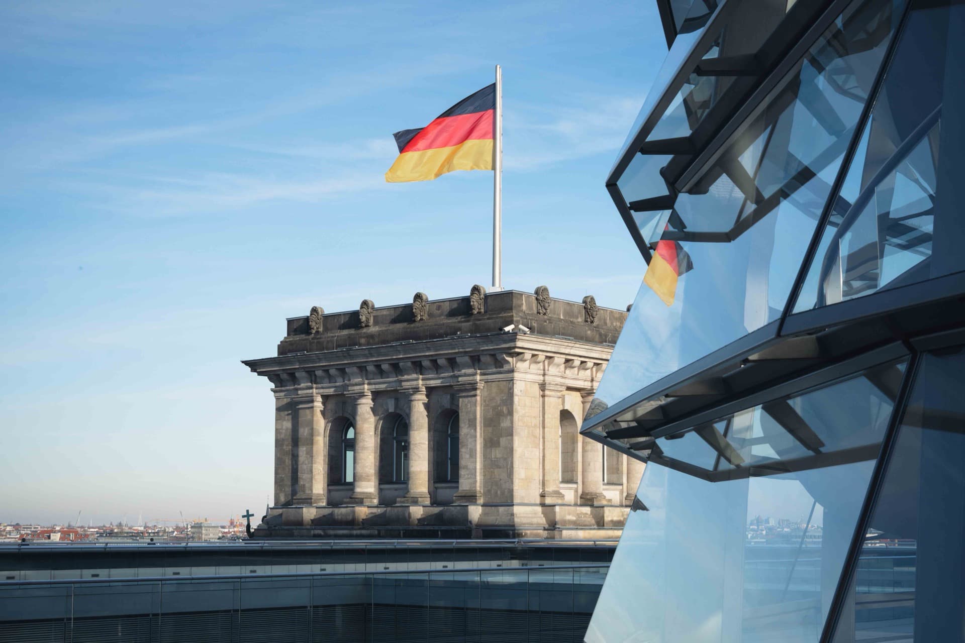 German Reichstag dome and flag in Berlin